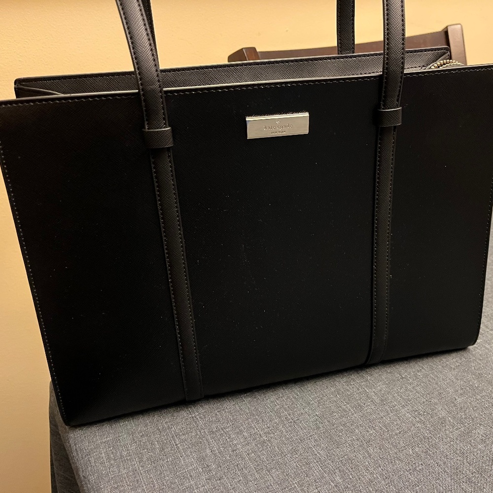 Kate Spade handbag, black man made material. Fairly large.